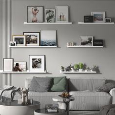 a living room filled with lots of furniture and pictures on the wall above it's coffee table