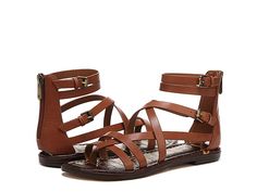 Sam Edelman Gibbs - Women's Shoes : Rich Cognac : Buckle up the Sam Edelman Gibbs sandals for a strappy style moment. Leather upper. Synthetic lining. TPR footbed. Zippered back with buckle closure. Ankle-length flat sandal. Round toe silhouette. Synthetic outsole. Imported. Measurements: Heel Height: 1 2 in Product measurements were taken using size 7, width M. Please note that measurements may vary by size. Weight of footwear is based on a single item, not a pair. Spring Slingback Sandals With Buckle Closure, Spring Footbed Strappy Sandals With Adjustable Straps, Casual Footbed Sandals With Heel Strap For Spring, Spring Open Toe Footbed Sandals With Heel Strap, Spring Footbed Sandals With Heel Strap, Spring Casual Footbed Sandals With Heel Strap, Spring Footbed Sandals With Heel Strap And Round Toe, Trendy Adjustable T-strap Sandals With Buckle Closure, Flat T-strap Sandals With Buckle Closure