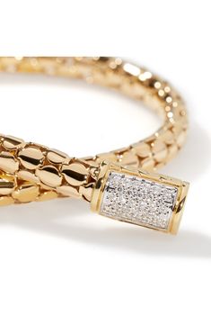 Polished 18-karat gold dots meet at a pavé diamond push-clasp on this handcrafted chain bracelet. Push-clasp closure Total diamond weight: 0.11ct. Color: G–H Clarity: S1 18k gold/diamond Imported >Diamond Guide Yellow Gold Pave Setting Chain Bracelet, Yellow Gold Chain Bracelet With Pave Setting, Man Gold Bracelet Design, Mens Diamond Bracelet, Mens Bracelet Silver, Mens Gold Bracelets, Bracelets Gold Diamond, Diamond Guide, Handcrafted Bracelets