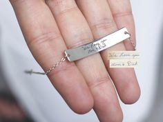 Every Handwriting Bar Bracelet tells a unique story. Customize your own with the beautifully handwritten words of a loved one, to keep them nearby, always. • Material: High-Quality Solid 925 Sterling Silver• Finish: Sterling Silver ∙ 18K Gold ∙ Rose Gold• Dimensions: 45mm Width x 7mm to 10mm Height (depending on your handwriting) SKU: MM-BM20