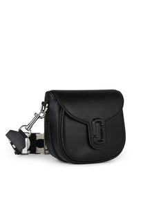 Made of smooth leather, removable shoulder strap with fabric logo with leather inserts, magnetic flap closure with tonal logo, large main compartment, one inner pocket, one inside zip pocket \n21 x 16 x 7 cmMARC JACOBS (THE)'SADDLE' BLACK LEATHER BAG Fabric Crossbody Bag, Fabric Logo, Black Leather Bag, Saddle Leather, Jacob Black, Black Leather Bags, Logo A, Crossbody Tote, Leather Gloves