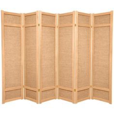 a room divider made out of wood and jute fabric, with four panels on each side