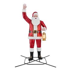 a statue of santa claus holding a bell and waving to the side on a white background