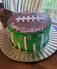 a birthday cake with a football design on it