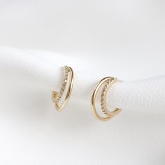 The Pari earrings feature paved crystals on the inner hoop, layered with a smooth hoop. Size: 15mm, paired with a smaller 12mm huggie (Approx.) Main material:   - 16k Gold/ Rose Gold/ Rhodium Plated, Brass,  - 92.5 Sterling Silver Post -  Cubic Zirconia --------------------------------------------------- Instagram Follow us @statementgrey Bridesmaids Earrings , Wedding Earrings, Pretty Earrings, Bridal Earrings, Bridal Jewelry, Bridesmaids Gifts Small Hoop Earrings For Wedding, Small Hoop Pierced Earrings For Wedding, Small Hoop Jewelry With Diamond Accents For Wedding, Elegant Hoop Wrap Earrings For Anniversary, Small Hoop Wedding Jewelry With Diamond Accents, Small Hoop Diamond Earrings With Accents For Wedding, Pierced Hoop Earrings For Wedding, Huggie Earrings For Wedding, Pierced Ears, Huggie Earrings For Wedding