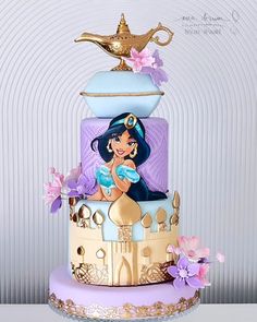 the cake is decorated with an image of princess pocahon from disney's animated movie