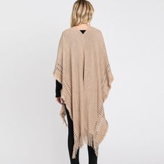 Size : 35.5" X 27.5" Material : 100% Acrylic Long Sleeve Fringe Poncho, Brown Poncho For Layering, One Size, Casual One Size Fringe Shawl, Fall Layering Shawl Poncho, Casual One-size Shawl With Fringe, Oversized Fringe Shawl For Winter, Oversized Fringed Shawl For Winter, Casual One Size Poncho With Fringe, Casual One-size Poncho With Fringe