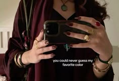 a woman holding up her cell phone with the caption you could never guess my favorite color