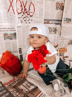 DIY Valentine’s Day photo shoot. Newspaper background, Valentine’s Day decorations from dollar tree. Toddler Valentine Picture Ideas, Valentine’s Day Diy Photoshoot, Valentines Day Baby Photoshoot At Home, January Month Baby Photoshoot, February Milestone Baby Boy Picture, Baby Boy First Valentines Day Pictures, Diy Valentines Photo Shoot Children