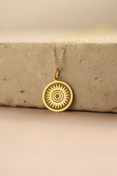 Gold Sun Pendant - Sun Gold Necklace ● Material of pendant: Solid Gold 14k ( REAL GOLD ) ● Metal Stamp: 14k ( REAL GOLD ) ● The pendant is available in 5 sizes: - 12,7 mm / 0.5 inches (Diameter) - 14,0 mm / 0,55 inches ( Diameter ) In the photos - 15,3 mm / 0.6 inches ( Diameter ) - 16,5 mm / 0,65 inches ( Diameter ) - 19,1 mm / 0,75 inches ( Diameter ) ( In the photos the size is 14mm / 0.55 inches Diameter ) ( Jump Ring inner diameter: 4 mm ) ● Material of chain: Solid gold 14k ( REAL GOLD ) I 14k Gold Spiritual Round Pendant Charm Necklace, Spiritual 14k Gold Charm Necklace With Round Pendant, 14k Gold Filled Spiritual Necklaces, Yellow Gold Round Necklace As Gift For Her, Yellow Gold Round Necklace For Her, Round Yellow Gold Charm Necklace Gift For Her, Yellow Gold Round Charm Necklace Gift For Her, 14k Gold Amulet Necklace Gift, 14k Gold Amulet Necklace For Gift