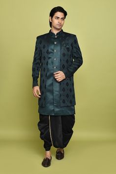 Green sherwani featuring feather pattern all over. Paired with a solid sleeveless inner kurta and a black dhoti. - Aza Fashions Designer Art Silk Sherwani With Cutdana, Semi-stitched Designer Sherwani For Navratri, Designer Bollywood Sherwani With Dori Work, Designer Art Silk Sherwani For Navratri, Festive Bandhgala With Traditional Drape, Formal Salwar Kameez With Traditional Drape, Traditional Drape Sherwani With Dori Work For Navratri, Traditional Sherwani With Dori Work For Navratri, Formal Navratri Sets With Traditional Drape