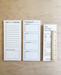 two notepads with the words get it done on them next to a ruler