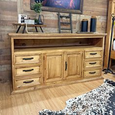 Embrace a classic rustic aesthetic with the Sierra Tv Stand finished in a warm natural stain and contrasting black metal hardware. This piece is timeless and build to last! LT-TVST-70-MED W(in): 69.69 - H(in): 35.83 - D(in): 19.69 70” Tv Console, Crate Tv Stand, Tv 70, Rustic Tv Console, Dog Crate Furniture, Leather Sofa Set, Rustic Aesthetic, Traditional Rustic, Dog Furniture