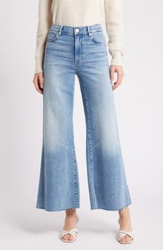 Made from superstretchy denim, these '70s-inspired palazzo jeans are remade for today with chewed hems and a slightly shorter inseam. 28 1/2" inseam; 28" leg opening; 11" front rise; 15" back rise (size 29) 77% cotton, 18% modal, 4% elasterell-p, 1% elastane Machine wash, tumble dry Made in Turkey Summer Wide-leg Flares With Frayed Hem, Spring Medium Wash Wide Leg Flares, Fall Medium Wash Wide Leg Flares, Fall Wide Leg Flares With Frayed Hem, Fall Wide-leg Flares With Frayed Hem, Light Wash Wide Leg Flares For Spring, Crop Wide Leg Jeans, Palazzo Jeans, Cropped Wide Leg Jeans