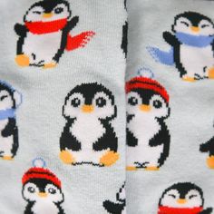 Penguin socks for women. Featuring cute penguins dressed up in hats and scarves for cold weather. These women's penguin socks are a great way to add a pop of color to any outfit. Playful Winter Socks For Gift, Playful Winter Gift Socks, Casual Warm Socks For Gift, Casual Warm Socks For Gifts, Casual Warm Socks Gift, Cute Snug Socks For Winter, Cute Snug Winter Socks, Trendy Winter Gift Socks, Novelty Winter Socks For Gifts