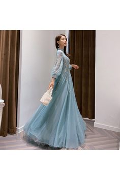 Elegant Fitted Fairy Dress For Prom, Light Blue Princess Dress For Prom, Light Blue Princess Style Prom Dress, Princess Style Light Blue Prom Dress, Fitted Fairy Dress For Prom, Spring Tulle Long Sleeve Evening Dress, Long Sleeve Fairy Dress For Wedding, Spring Long Sleeve Tulle Evening Dress, Blue Princess Style Evening Dress For Parties