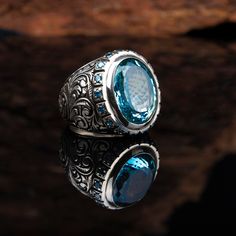 Material: 925 Sterling Silver Stone Type: Blue Topaz Ring Top Dimensions: 20 x 15 mm Average Weight: 27 gr. (depends on your ring size)  Shipping via DHL Express by The Grand Bazaar Istanbul. Delivery Takes 1-3 days to any worldwide location. Shipping is free of charge. FOR MORE HANDMADE JEWELRY VISIT: https://www.etsy.com/shop/GrandBazaarExclusive Gemstone Ring For Men, Turkish Ring, Blue Topaz Gemstone, Blue Topaz Stone, Average Weight, Sky Blue Topaz, Men Ring, Topaz Stone, 925 Silver Ring