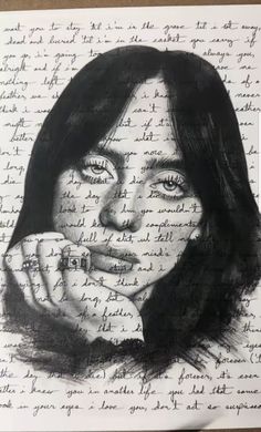 a drawing of a woman's face on top of a piece of paper with words all over it