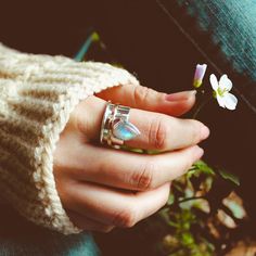 A unique and one-of-a-kind two-tone Moonstone spinner ring! This sterling silver spinner ring has a gold-tone ring to spin and a gorgeous genuine Moonstone gemstone. Moonstone delicately connects us to the wisdom of the moon and our own inner goddess. It is also deeply connected to water. Material: Genuine Sterling Silver 92.5 Gemstone: Moonstone Ring size: Choose your size Length/wide: 18mm Stone size: 13mm Condition: Brand new Black Tourmaline Jewelry, Full Finger Rings, Raw Stone Jewelry, Rose Quartz Jewelry, Ear Jacket Earring, Bee Jewelry, Chevron Ring, Tourmaline Jewelry, Silver Spinner Rings