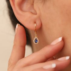 Discover elegance with our 14K Solid Gold Teardrop Earrings, featuring genuine Diamonds & Sapphires - September's gems. Perfect Mother's Day gift, these heirloom-quality dangles shimmer with authenticity and grace, celebrating love and timeless beauty. Experience the heartfelt craftsmanship in each piece. Sapphire symbolizes loyalty, love and longing. It gives positive vitality with the wonderful energy given by its color. Our 14K solid gold dangling drop sapphire earring surrounded by diamonds Gold Sapphire Earrings, 14k Gold Dangle Teardrop Earrings For Anniversary, 14k Gold Teardrop Dangle Earrings For Anniversary, Sapphire Earrings Drop, Sapphire Drop Earrings, Sapphire Earring, Sapphire And Diamond Earrings, Stone Dangle Earrings, Teardrop Dangle Earrings