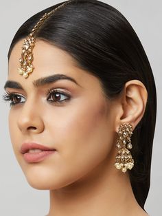 Beautiful kundan earrings with stones and pearls, plus matching mang tikka Traditional Indian Jewelry: Slight Color variations are possible due to lighting and photography. If you are interested in purchasing this item and have any additional questions about this item, please feel free to email us at nazranaanj@gmail.com. For faster responses, call us at 732-283-1808 or WhatsApp us at 609-852-9922 Care instructionsKeep Jewelry away from direct heat, water, perfumes, deodorants and other strong - Kundan Pearl Earrings With Stone Work For Gift, Kundan Bridal Earrings With Tilla, Kundan Temple Jewelry Chandelier Earrings For Wedding, Kundan Pearl Earrings With Stone Work For Celebrations, Diwali Kundan Pearl Earrings With Stone Work, Kundan Bridal Earrings With Tilla Detail, Kundan Bridal Earrings With Pearl Drop For Diwali, Kundan Pearl Earrings For Celebration, Kundan Dangle Bridal Earrings In Temple Style