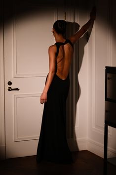 Louise Slinky Backless Maxi Dress - Black Black Silky Backless Dress, Black Backless Silk Dress, Backless Dress Bow, Backless High Neck Dress, Maxi Dress Winter Formal, Long Dress With Open Back, Backless Black Maxi Dress, Deep V Open Back Dress, Backless Dresses Elegant