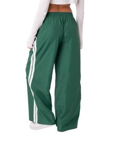 Edikted Fauna Nylon Track Pants Green Nylon Parachute Pants For Streetwear, Nylon Wide-leg Pants With Elastic Waistband, Wide-leg Nylon Pants With Elastic Waistband, Full-length Nylon Athleisure Pants, Full Length Nylon Athleisure Pants, Green Nylon Sporty Parachute Pants, Sporty Wide-leg Parachute Pants For Fall, Spring Nylon Pants With Elastic Side Panels, Sporty Wide Leg Parachute Pants For Fall