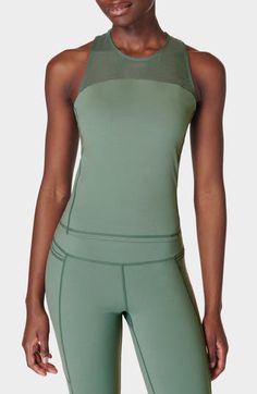 A built-in sports bra provides added support to this sweat-wicking mesh-yoke tank designed with cross-back straps and quick-drying abilities. 19" length (size Medium) Jewel neck Fixed straps Built-in bra Moisture-wicking fabric engineered for dryness and comfort 62% polyamide, 38% elastane Machine wash, dry flat Imported Sports Activewear Tank With Built-in Bra, Elastane Tank Activewear With Built-in Bra, Green Gym Tank Top With Built-in Bra, Activewear Tank With Built-in Bra And 4-way Stretch, Green Moisture-wicking Yoga Tank Top, Sweaty Betty, Tank Design, Workout Tanks, Cami Tanks