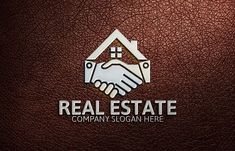 the real estate company logo is shown on a brown leather surface with two hands shaking each other