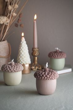 "HANDMADE! MADE TO ORDER! The Acorn-shaped candle, a symbol of nature's bounty, invites us to embrace the autumnal spirit, inviting us to slow down and appreciate the fleeting moments of this magical season. Ingredients:  Pure Soy Wax, Natural White Beeswax, Cotton Wick, Premium Fragrance oil, Candle Dyed Color:  Ivory (undyed), Castle Beige, Moss Green Dimension:  3.75\" W x 4\"H Weight:  14.1oz (400g) Scent Note:  Cypress, Pine, Eucalyptus, Mint, Tonka Bean, Smoke Made in the USA NOTICE Each one is handmade and wrapped by hand, and due to the nature of this, they may vary slightly, some small imperfections may be present, which does not affect the use. ABOUT SHIPPING Made just for you. Candles take 3-5 business days to make. Ready to ship in 1 week. BURNING INSTRUCTIONS 1. THE MOST IMPOR Fall Candle Ideas, Christmas Candle Crafts, Fall Scented Candles, Autumn Candles, Decoration Candles, Cypress Pine, Christmas Candles Diy, Baby Candle, Thanksgiving Candles