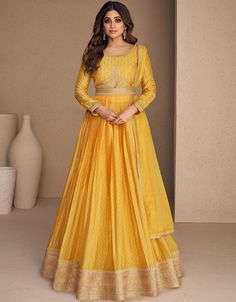 🌼 Embrace Vibrant Yellow Glamour! Discover our Yellow Chinon Silk Anarkali - a perfect blend of tradition and modern allure. Ideal for creating a striking and stylish look that exudes confidence. Get ready to make a fashionable statement with your refined fashion sense and capture attention with your vibrant style! ✨👗 #ArabicAttireFashion #YellowChinonAnarkali #EleganceInYellow #ModernTradition #AnarkaliGlam Yellow Anarkali Dress, Anarkali Lehenga Gowns, Yellow Dupatta, Abaya Styles, Yellow Anarkali, Dress Anarkali, Silk Anarkali, Gown With Dupatta, Gown Suit