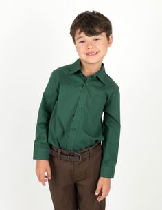 70% Cotton 30% Poplin Variety of colors Machine wash cold & inside out A classic, essential and versatile piece for his wardrobe. Our button down shirts are made of super soft cotton blend and come in a variety of colors to suit any occasion for a polished & timeless look. These shirts coordinate great with our kids chino pants.