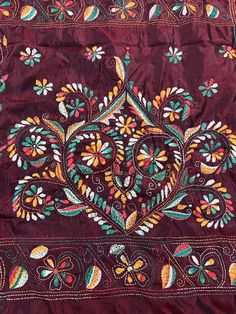 Gorgeous Deep Maroon saree with handwoven Kantha stitch work in Multi color. Item: SareeColor : Deep Maroon with Multi color Kantha Work Base Fabric: Bangalori Silk Blouse piece : YesBlouse material: Bangalori Silk Work: Handloom, Kantha Work Fall & Edging (Yes/No) : Yes Disclaimer -:- Color variation is possible due to various reasons like phone or desktop setting, resolution etc. Please don't hold us responsible. Our aim is to put the exact color of the Saree.- If the Saree is Pure Silk, we wi Bohemian Silk Dupatta With Dori Work, Bohemian Resham Embroidery Saree For Eid, Bohemian Saree With Resham Embroidery For Eid, Traditional Fabric For Festive Occasions, Semi-stitched Silk Fabric With Traditional Embroidery, Semi-stitched Bohemian Saree In Embroidered Fabric, Bohemian Semi-stitched Saree In Embroidered Fabric, Bohemian Dori Work Blouse For Festivals, Bohemian Saree With Resham Embroidery For Festive