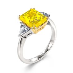 Always be on her mind when you propose with this classic three stone emerald-cut engagement ring. It is a classic piece with a lower profile that features emerald-cut yellow stone with a pair of trillion-cut white stone to bring the sparkle up. This classic designed ring will really look amazing on your bride-to-be's finger and it will be a gift that she never forgets.Carat Weight: 3.65 ctStone Size: 7*9 mmStone Type: Jeulia® StoneNumber of Stones: 1 Stone Shape: RadiantStone Color: Citrine YellowCarat Weight: 0.69 ctStone Size: 4*4 mmStone Type: Jeulia® StoneNumber of Stones: 2 Stone Shape: TrillionStone Color: Diamond WhiteWeight: 3.52 gMaterial: 925 SilverPlating Color: Silver, Yellow Gold Yellow Emerald Cut Diamond Ring, Emerald Engagement Ring Cut, Yellow Stone, White Stone, Three Stone, Emerald Cut, Quality Jewelry, Sterling Silver Ring, Citrine