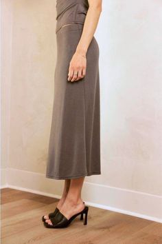 This fit-and-flare midi skirt is made from a soft, modal fabrication with a mid-rise, elasticated waist. Material 73% Modal, 27% Polyester Versatile Midi Maxi Skirt For Spring, Versatile Midi Skirt For Spring, Modest Midi Skirt For Fall, Fall Daywear Skirted Bottoms, Casual Flowy Viscose Maxi Skirt, Casual Viscose Maxi Skirt With Lining, Casual Viscose Lined Maxi Skirt, Rayon Long Skirt For Daywear, Flared Viscose Maxi Skirt