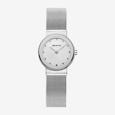 Classic, puristic, and yet exciting. Perfect style combined with contemporary minimalism. Inspired by Danish design, the CLASSIC COLLECTION represents a unique timepiece, perfectly highlighting your daily style.The polished silver colored stainless steel case, made of pure, high quality, medical-grade stainless steel (316L), in combination with the modern silver colored milanese strap, provides the classic BERING look. The fine workmanship of the milanese strap gives the watch a refined, almost Minimalist Silver Watch With Bracelet Strap, Minimalist Silver Watches With Bracelet Strap, Modern Stainless Steel Watches, Modern Stainless Steel Round Watches, Minimalist Analog Watch Accessories With Round Dial, Modern Everyday Watches With Metal Dial, Minimalist Watch Accessories With Subdials, Minimalist Analog Watches With Round Dial, Minimalist Silver Watch Accessories For Everyday