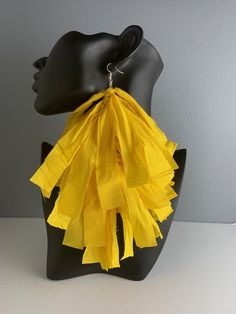 Yellow fabric fringe frayed long hanging earrings. Statement piece earrings. Bold, fun, attention-getting.  Made for pierced ears. Yellow Latkans Earrings For Party, Summer Party Earrings With Latkans, Yellow Latkan Earrings For Party, Summer Party Fringe Earrings, Yellow Party Earrings With Latkans, Summer Fringe Chandelier Drop Earrings, Yellow Fringe Jewelry For Party, Colorful Handmade Dangle Tassel Earrings, Yellow Fringe Earrings For Summer