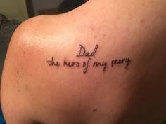 a tattoo that reads dad the hero of my party