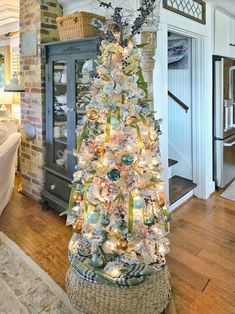 a decorated christmas tree in a living room