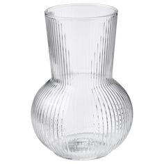 a clear glass vase sitting on top of a table