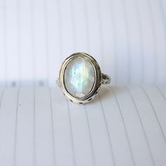 Rainbow moonstone ring, Sterling Silver ring, cocktail ring, alternative engagement ring, Rainbow moonstone jewelry, Valentine's day jewelry, silver jewellery Description: Be assured that the product you order is MADE JUST FOR YOU and is not a mass produced item. The gemstone is a pear shaped RAINBOW MOONSTONE The rest of the ring is made from 925 STERLING SILVER i.e 92.5% pure silver. And it DOESN'T HAVE ANY LEAD OR NICKEL. I make more than 50 DIFFERENT GEMSTONES. If you want other gemstones, P Silver Sterling Silver Moonstone Ring, Silver Moonstone Ring With Stone Setting, Silver Sterling Moonstone Ring Fine Jewelry, Unique Silver Moonstone Ring With Stone Setting, Fine Jewelry Silver Moonstone Ring In Sterling Silver, Handmade Silver Moonstone Ring Fine Jewelry, Elegant Silver Moonstone Ring, Sterling Silver White Gold Moonstone Ring, Silver Moonstone Ring Fine Jewelry For Gift