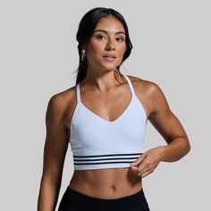 Our Level Up Sports Bra was created to truly feel like a second skin. To deliver just that, we started with a seamless design that delivers unmatched comfort while hugging your body without restricting your movement. Then, we used a moisture-wicking and breathable fabric to keep you comfortable when working up a sweat and finished it off with an extended body for added coverage when wearing on its own. Supportive Sports Activewear With Built-in Bra, Compressive White Sweat-resistant Activewear, White Compressive Sweat-resistant Activewear, Sporty Supportive Running Activewear, Athletic Fit Activewear With Built-in Bra For Training, White Stretch Activewear With Built-in Bra, Technical Stretch Sports Bra With Go-dry, Technical Sports Bra With Go-dry Stretch Technology, Technical Stretch Sports Bra With Go-dry Technology