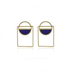 ■ Origin: Handmade in Afghanistan ■ The earrings: Geometric frame earrings with crushed lapis lazuli. Stud fastening. ■ Materials: 24k gold plated brass; Blue gemstone (lapis lazuli) ■ Dimensions: 4.3cm x 2.3cm ■ Ethical Commitment: Fair Trade Certified ■ Nargis's Notes ■ Discover The Rug Mine's latest collection of artisanal crafts, showcasing the world's finest handmade creations. These earrings are a testament to authentic Afghan artistry, inspired by the Hindu Kush mountain range that stretc Minimalist Blue Brass Earrings, Modern Blue Brass Earrings, Modern Blue Lapis Lazuli Jewelry, Blue Minimalist Brass Jewelry, Minimalist Blue Brass Jewelry, Blue Lapis Lazuli Rectangular Jewelry, Blue Minimalist Pierced Jewelry, Blue Lapis Lazuli Earrings For Gift, Blue Rectangular Gemstone Earrings