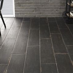 Sold per Box of 8 Tiles(1 Box = 10.49 Sq Ft) Distressed black wood look large format porcelain tile for walls and floors. Distressed black wood look 8x24 porcelain extruded tile. 12 tile faces. SPECIFICATIONS TILE SIZE: 8x24 in. (Tile Calculator) SQUARE FOOT PER BOX: 10.49 sq. ft. (8 pieces) BOXES PER CRATE: (Contact for pricing) INSTALLATION: Individual tiles for standard installation. FINISH: Matte MATERIAL Distressed Wood Look Porcelain Tiles Distressed wood look porcelain tile provides a rustic, vintage look that is ideal for farmhouse style kitchen, bathroom, living room, and entryway wall and floors. Decorative porcelain tile is highly durable and easier to clean and maintain than other wall and floor coverings. ORDERING OVERAGE: We recommend ordering a minimum of 10% overage to acco Bathroom Tile Rustic, Tile That Looks Like Wood, Black Floor Tile Bathroom, Tile That Looks Like Hardwood, Harringbone Tile, Wood Look Porcelain Tile Floors, Black Herringbone Tile Floor, Rustic Tile Floor, Wood Looking Tile