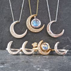 "This unique crescent moon phase pendant is available in silver or 14 k gold. So beautiful polished but equally stunning hand-finished matte, hammered or have it encrusted with diamonds. A focal piece that can be stacked with smaller pendants. It's a slide providing space for a pendant to fit into the opening. We've paired it with our bezel set moonstone. crescent moon 24 millimeters long x 19 mm wide or/ almost 1\" long x 3/4\" wide 14k solid gold or sterling silver pave Diamond encrusted Cresc Luxury Sterling Silver Moon Charm Jewelry, Luxury Silver Jewelry With Moon Charm, Luxury Sterling Silver Jewelry With Moon Charm, Luxury White Gold Moon-shaped Jewelry, Celestial Crescent Jewelry In White Gold, Silver Moon-shaped Diamond Jewelry, Silver Moon Shaped Diamond Jewelry, Silver Diamond Moon-shaped Jewelry, Fine Jewelry Diamond Moon Phase