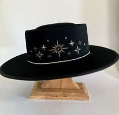 This black starlet hat is hand embroidered in Bisbee AZ and designed by Diana Dawn for Free People Diy Leather Hat, Hat Burning, Hat Bar, Cowboy Aesthetic, Painted Hats, Black Cowboy, Unique Hats, Hat Embroidery, Fancy Hats