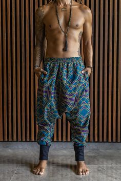 Harem Pants Men, Rave Outfit Men, Psychedelic Pants VALO SPIRIT NINJA Blue Geometric - Comfortable & stylish cotton print harem pants Slim leg drop crotch harem sarouel pants. You can wear them long for a warmer feel or pulled up on the shin or below the knee. The fabric is well breathing, smooth 100% cotton. Two Zipper pockets to keep your valuables safe! Inside fabric of the pockets is made from bamboo stretch. Allows freedom of movement without restrictions. COMBINES PERFECTLY with the tops f Straight Festival Pants With Pockets, Casual Pants With Pockets For Festivals, Casual Festival Pants With Pockets, Traditional Multicolor Trousers, Harem Pants With Pockets For Festivals, Blue Festival Pants With Elastic Waistband, Relaxed Fit Harem Pants For Festival, Blue Pants With Elastic Waistband For Festival, Multicolor Straight Pants For Festival