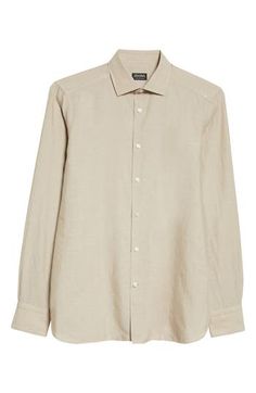 Presented in a delicate dusty-beige hue, this long-sleeve button-up is crafted from a soft, breathable blend of cotton, linen and silk for year-round comfort. Front button closure Point collar Long sleeves with button cuffs 60% cotton, 25% linen, 15% silk Dry clean Made in Italy Men's Designer Clothing Beige Button-up Shirt With Button Cuffs, Luxury Cream Cotton Shirt, Beige Linen Button-up Blouse, Beige Button-up Shirt With Button Closure, Luxury Garment Washed Button-up Shirt, Silk Button Up, Fabric Gift Bags, Designer Clothes For Men, Free Fabric