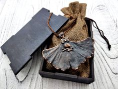 This natural leaf necklace is handcrafted with love and passion in my home studio. A beautiful pendant made from a real ginkgo biloba leaf with owl symbol, encased in thick and durable copper. I use real fresh leaf and cover it with the fine copper. This piece of jewelry is very special. It is just by the fact that it is irregular. Just as it is, it has been available in nature. Fully handmade item. Real artifact! Great gift idea for someone who likes unusual things! DETAILS: - This ginkgo bilob Copper Flower Pendant Necklace As Gift, Copper Leaf Jewelry Gift, Copper Leaf-shaped Jewelry Gift, Unique Leaf-shaped Necklace For Gifts, Brown Leaf-shaped Jewelry For Gift, Owl Symbol, Citrine Crystal Necklace, Real Leaf, Raw Crystal Jewelry