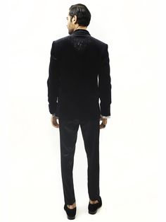 Astrum handcrafted tuxedo is highlighted with metallic threads. Single-buttoned satin detail shawl collar. This creation in velvet can be tempered with flat-front trousers for a reception look. Embroidered Tuxedo, Reception Look, Metallic Thread, Shawl Collar, Hand Embroidered, Shawl, Trousers, Velvet, Satin